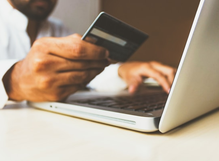 Hand holding credit card