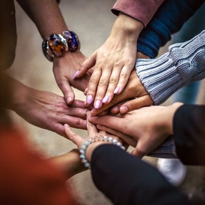 Hands joined together in unity