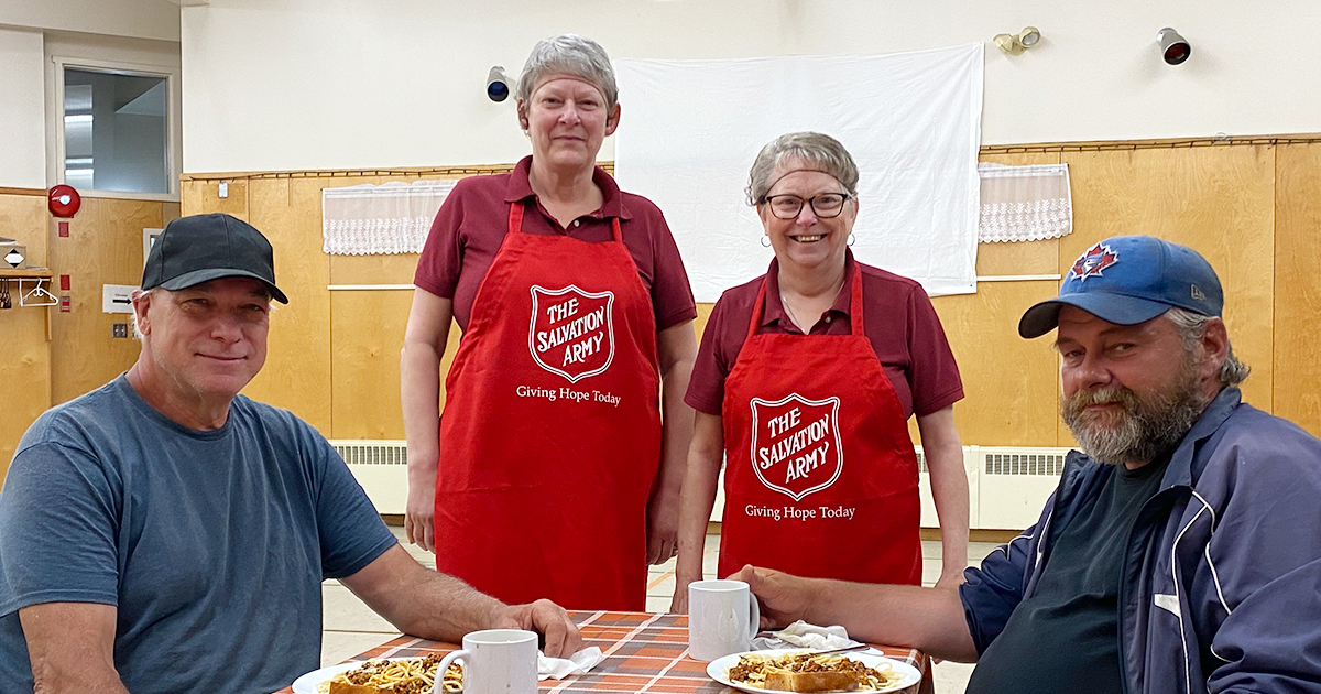 Four people having a meal together